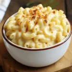 Slow cooker mac and cheese with cream cheese in a white bowl