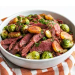 Slow cooker corned beef and brussel sprouts served in a bowl