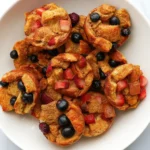 French Toast Muffin Cups with blueberries and strawberries