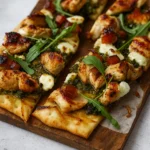 Pesto Chicken Flatbread on rustic table