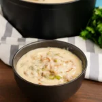 Philly Cheese Steak Soup in a bowl with cheese and vegetables