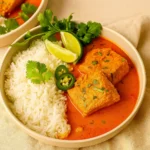 Coconut Curry Braised Salmon Recipe with rice and lime