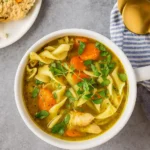 Easy Chicken Noodle Soup with Egg Noodles in a rustic bowl